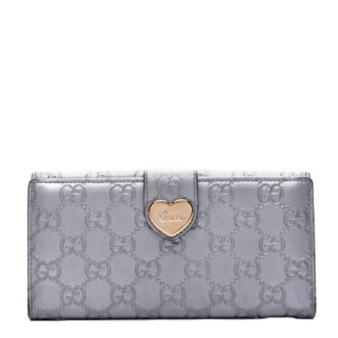 gucci wallet with heart clasp|GUCCI Guccissima Heart Continental Wallet Silver.